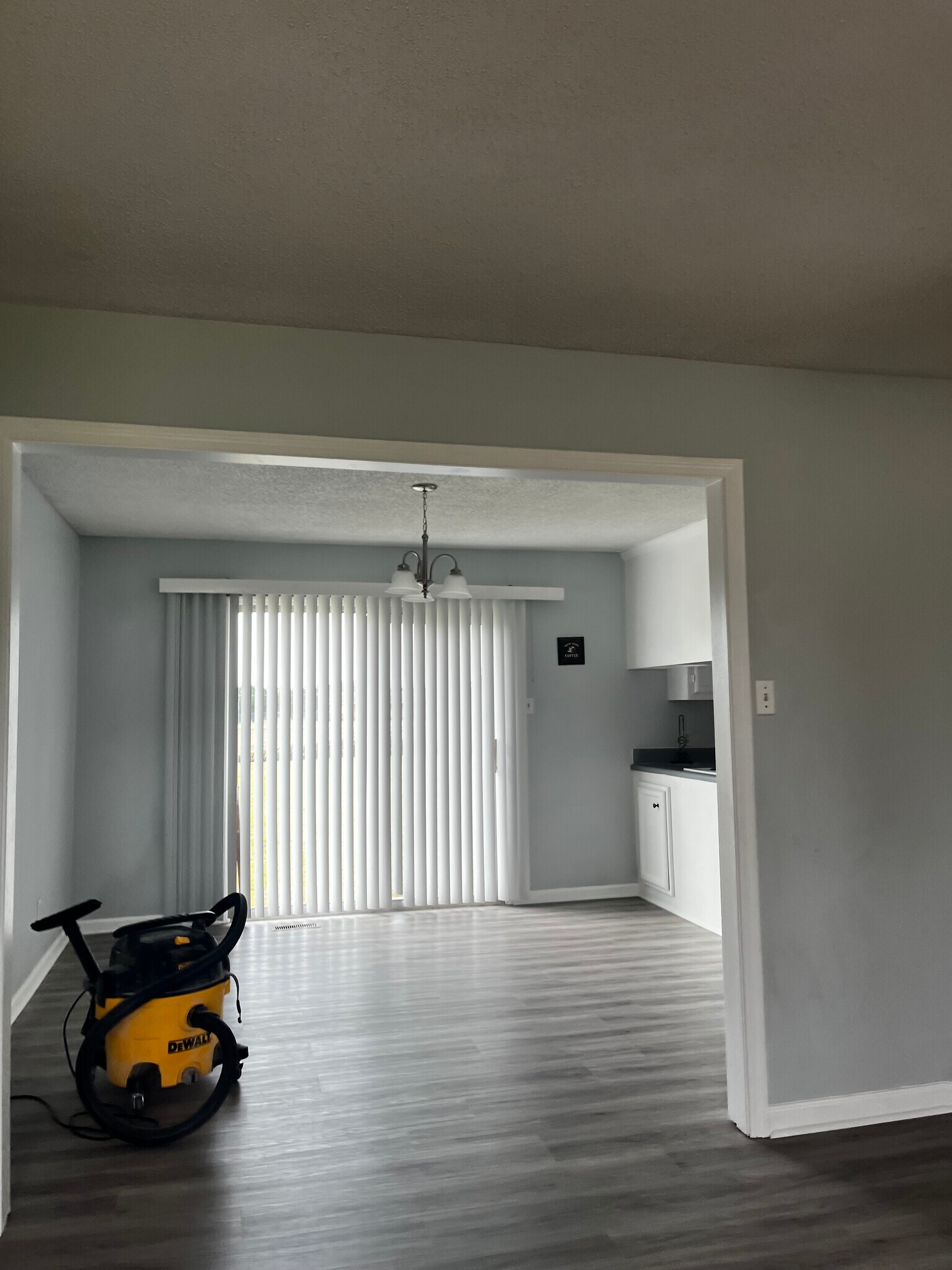Dining area with glass doors to patio - 112 Kelly Ct
