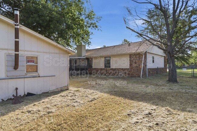 Building Photo - 11648 N 104th E Ave
