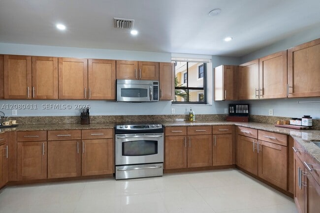 Building Photo - 8390 SW 72nd Ct