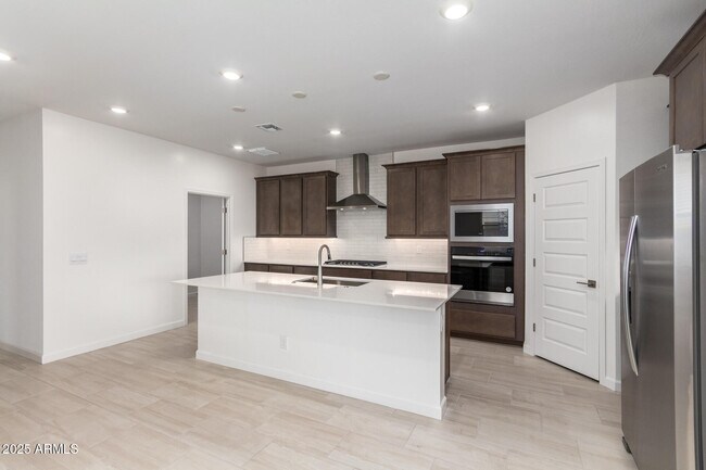 Building Photo - 6777 W Molly Ln