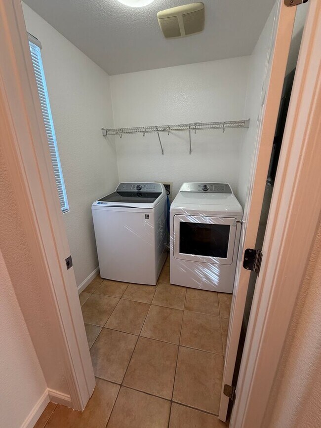 Building Photo - 4 bedroom | 2.5 bathroom | Single family home in West Sacramento's Bridgeway Lakes neighborhood