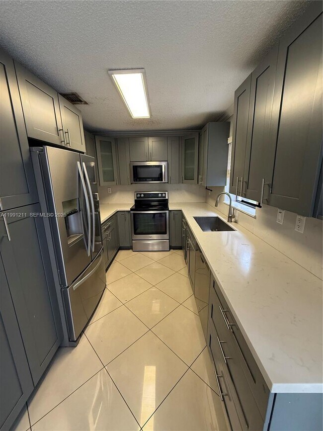 Building Photo - 6854 NW 173rd Dr