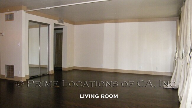 Building Photo - Experience Downtown Living with this upgra...