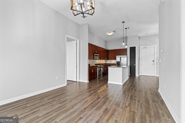 Building Photo - 711 Cosmopolitan Dr NE