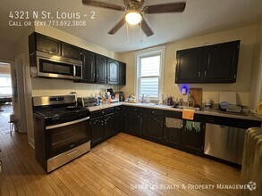 Building Photo - Awesome, Spacious, Updated, Sun-Filled, Ir...