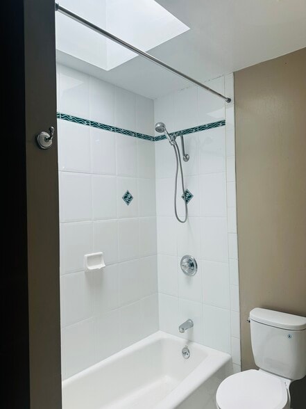 Bathroom tub/shower with skylight - 245 Concord St