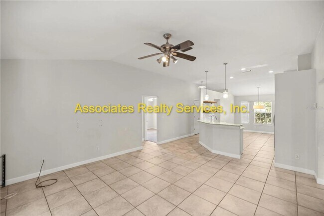 Building Photo - Charming, spacious 3bed/2bath home w/ office, screened patio & double car garage in Northridge su...