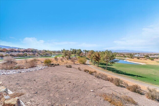 Building Photo - 4-Bedroom Tuscany Townhome with Strip & Golf Course Views