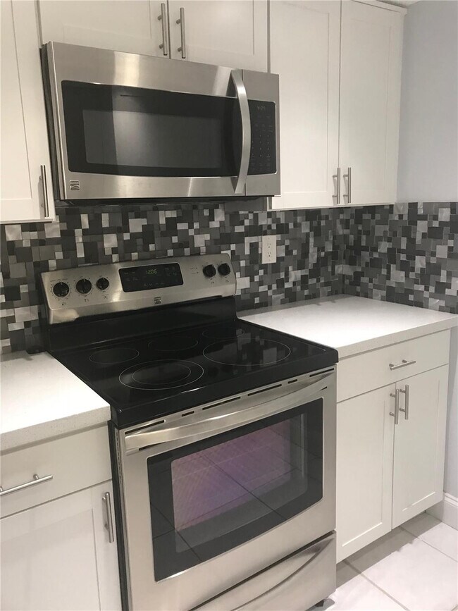 Building Photo - 9576 SW 1st Ct