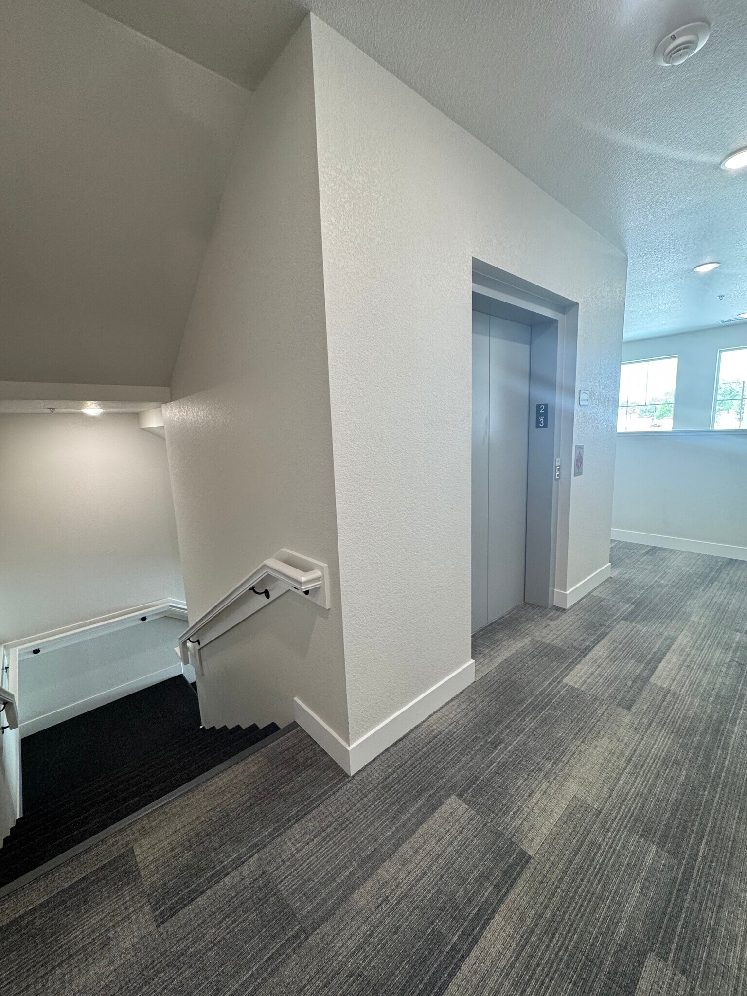 Stair or elevator access on second floor on West side of building - 265 High Point Dr