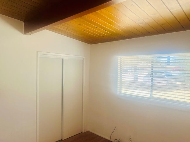 Building Photo - Charming 3-Bedroom Home with Wood Ceilings...