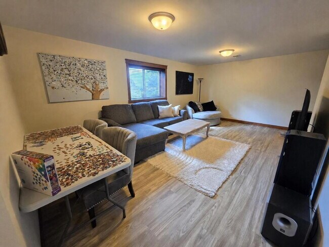 Building Photo - FREE SEPTEMBER RENT for this Spacious 4-Bedroom Home with Vaulted Ceilings with Finished Basement...