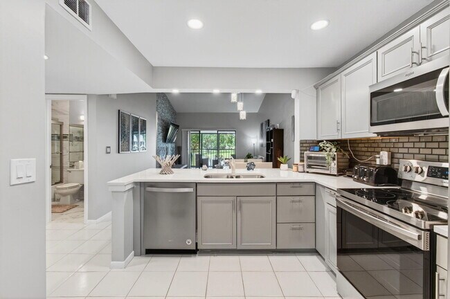 Building Photo - 8364 Boca Glades Blvd E