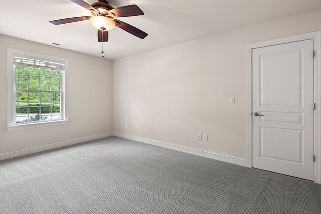 Building Photo - Five-Bedroom Tudor Home with Main-Level Primary Suite in Albemarle Reserve