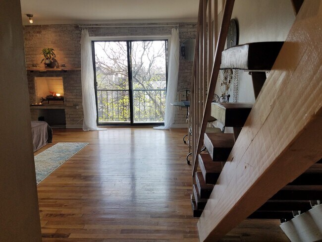 Main Floor | Exposed Bricks | Fireplace | Balcony | Southern Exposure - 832 W Oakdale Ave