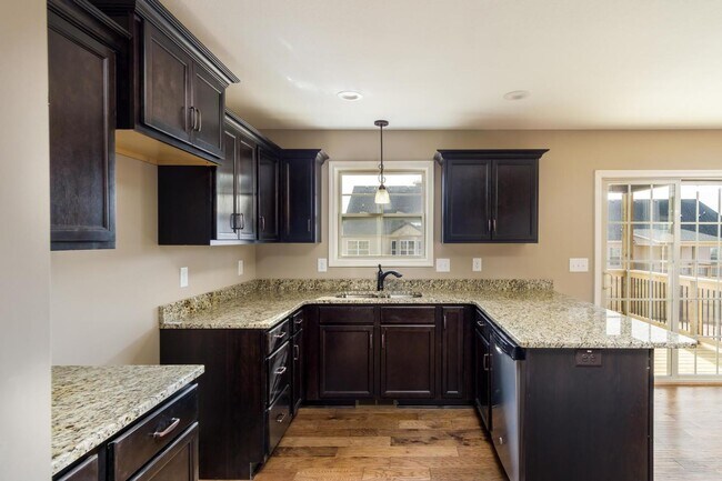 Building Photo - Pet Friendly Three Bedroom with Bonus!