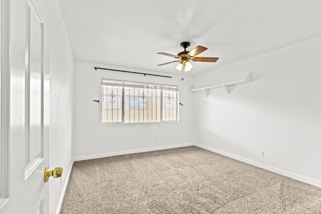 Building Photo - "Charming 3-Bedroom Townhouse Oasis with 2 Full Baths in Las Vegas – 1220 Sq Ft of Comfortable Li...