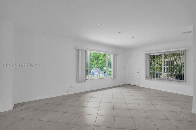 Building Photo - 8851 Byron Ave