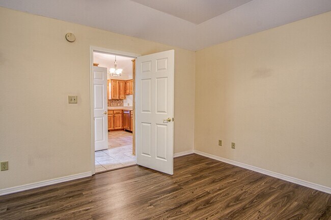 Building Photo - This beautiful home is located in a quiet private neighborhood and perfect for a serene living at...