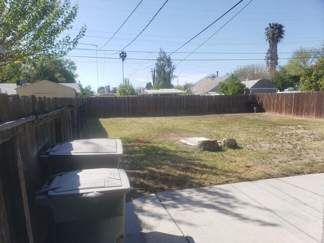 Building Photo - Beautifully Renovated Home with Updated Kitchen and bath, paint, and flooring! FREE SOLAR TOO!!!!