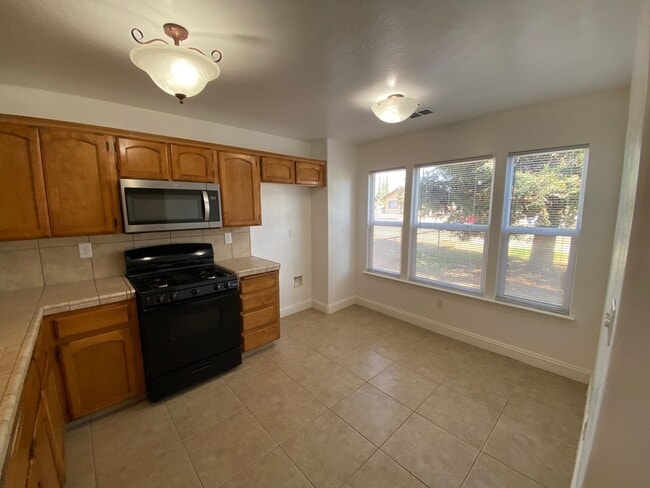 Building Photo - Spacious Exeter Home coming soon!