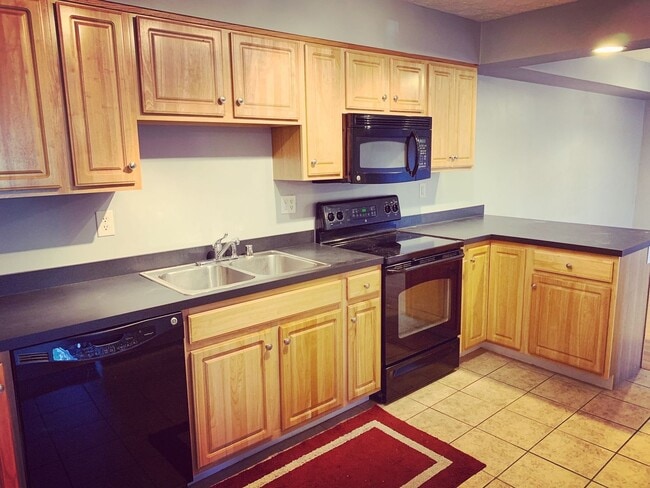 Building Photo - Spacious 3-Bedroom Ground-Floor Condo with...