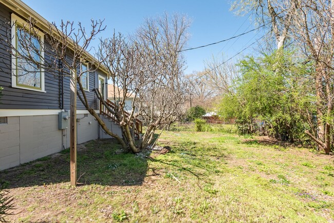 Building Photo - Available March 1 - Golden Belt Stunner! P...