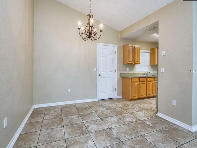 Building Photo - Charming 3/2 with large fenced yard!