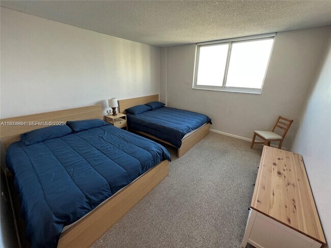 Building Photo - 19380 Collins Ave