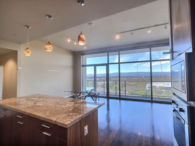 Building Photo - Stunning 2 Bedroom Penthouse Condo with Sp...