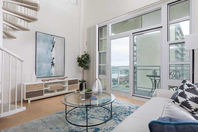 Building Photo - Penthouse loft with a private rooftop patio