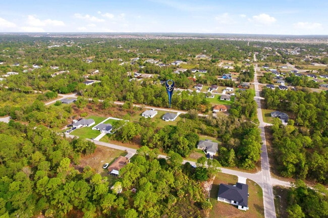 Building Photo - Brand New 4-Bedroom Gem with 2 Full Baths on Large Lot in Lehigh Acres – A Perfect Family Haven!