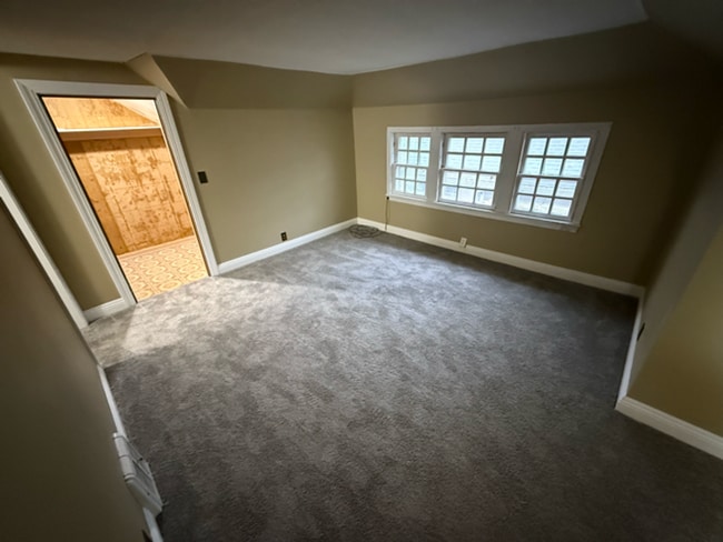 Building Photo - ? Updated 4BR/2BA Single-Family Home — Garage Parking, Water & Lawn Care Included ?