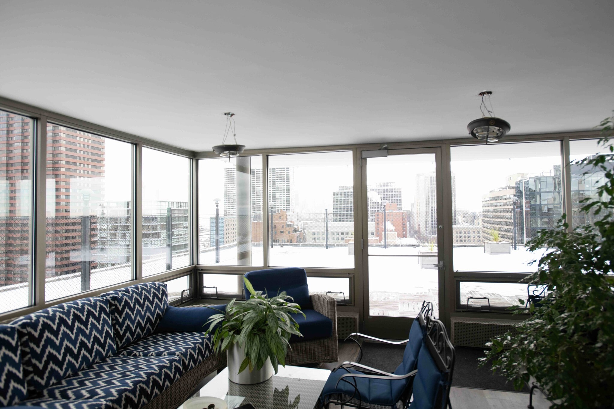 Rooftop indoor lounge - 360 W Wellington Ave