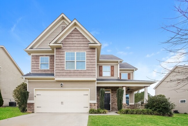 Primary Photo - Modern 4-Bedroom Home with Fenced Yard