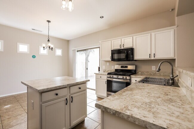 Building Photo - 12925 W Charter Oak Rd