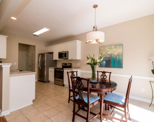 Dining area with walkout private deck and entertainment area - 217 Brushy Creek Ln
