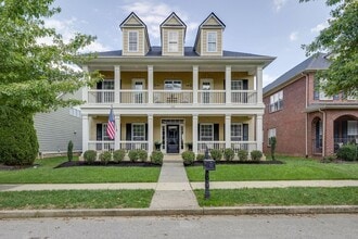 Building Photo - Located in the highly sought-after Avalon community in Franklin, this stunning 5-bedroom, 3.5-bat...
