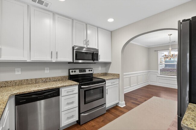 Building Photo - Move-In Ready Gem with Main-Level Owner's Suite