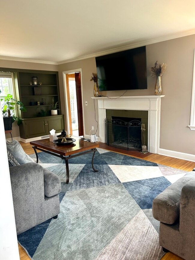 Building Photo - Sunroom Retreat | Fully Furnished 3BR with Private Fenced Yard