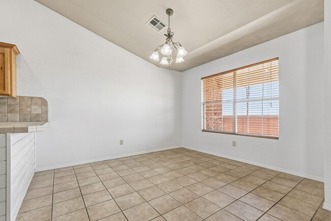 Building Photo - 4 Bedroom 2 Bath with Solar on a Large Corner Lot