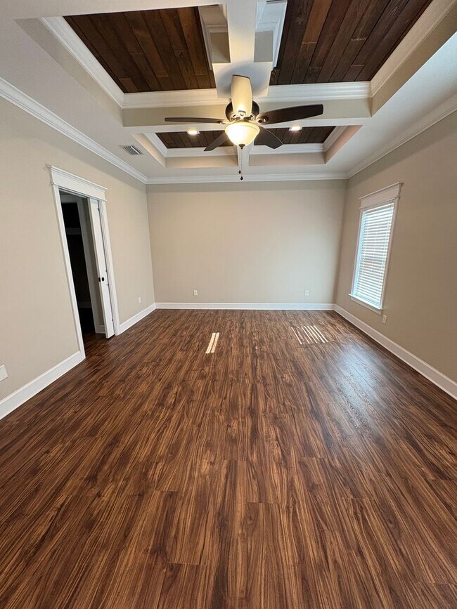 Building Photo - Available Now: Expansive 4BR Home with Rare 3-Bay Carport