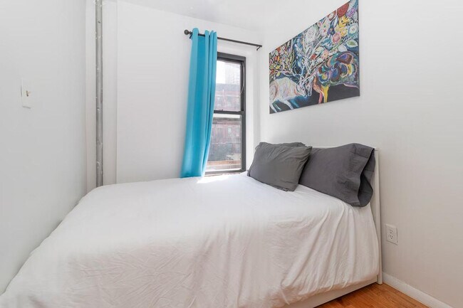 Building Photo - 306-318-318 E 96th St