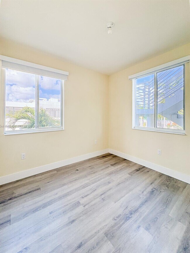 Building Photo - 6416 NW 102nd Ct