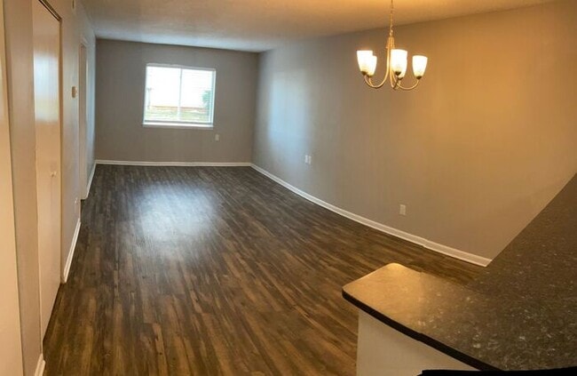 Building Photo - Just off the main road, but in walking dis...