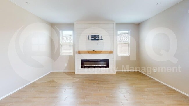 Building Photo - 10587 W Chadwick Dr
