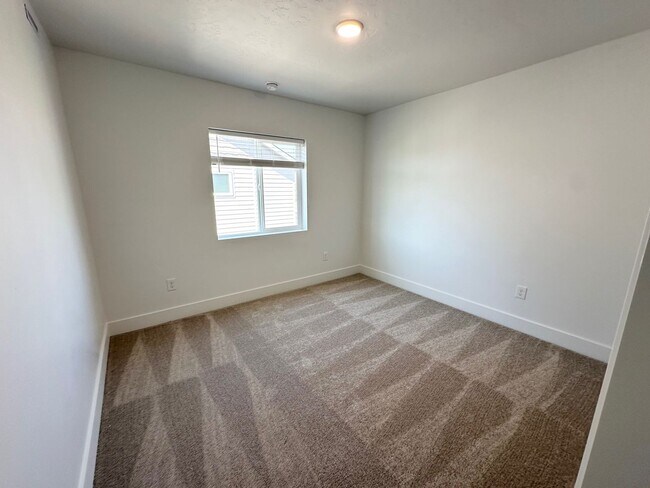 Building Photo - Spacious Luxury Townhome Designed for Modern Living available soon!