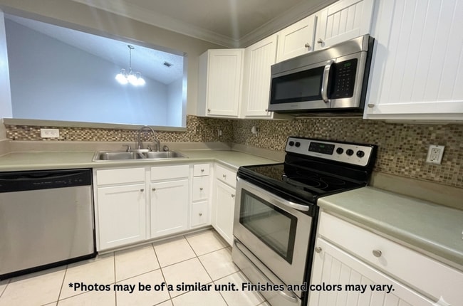 Building Photo - RENT PRICE IS FOR ENTIRE UNIT, NOT PER BEDROOM!