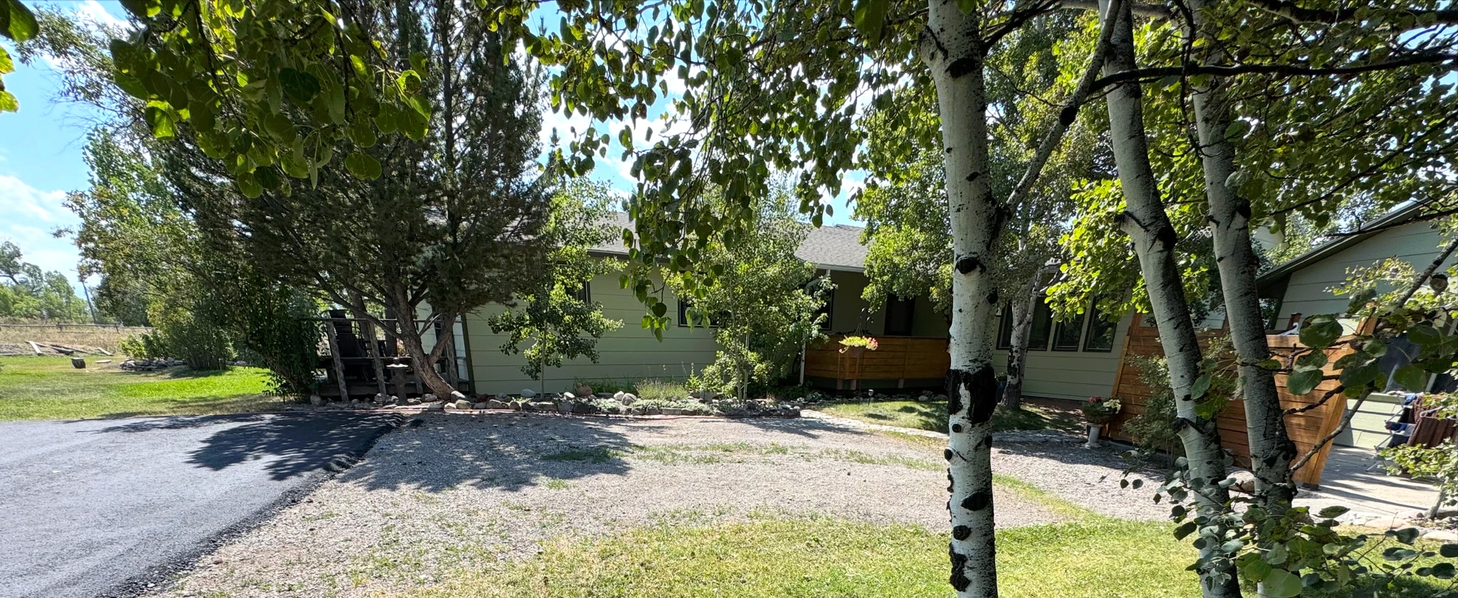 Main house front. Lots of trees and flowers! - 2541 Blackjack Pl