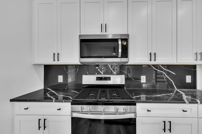 Building Photo - Modern New Construction Townhome with Roof...